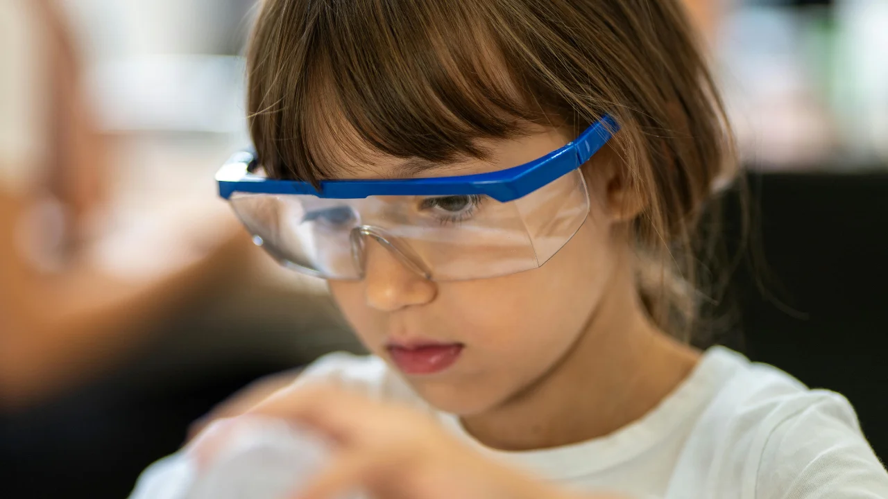 Child wearing safety goggles